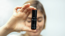 Inlight Lip Serum in Hand 1.webp